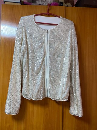Chaqueta de lentejuelas doradas