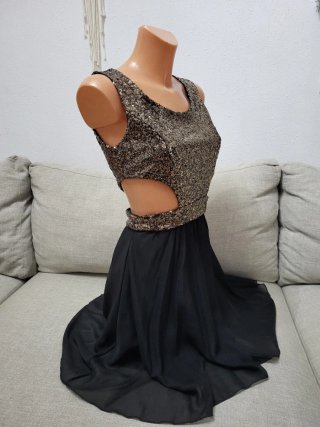 Vestido corto con lentejuelas dorado y negro