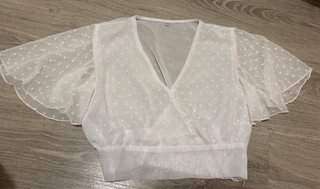 Blusa blanca transparente volantes