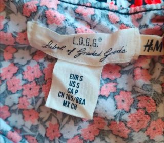 Blusa H&M un hombro floral Talla S