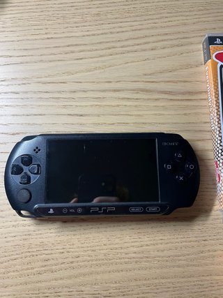 Lotto PSP Sony + 6 giochi