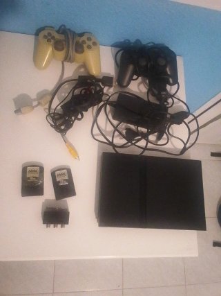 Consola PlayStation 2 (no funciona) con accesorio