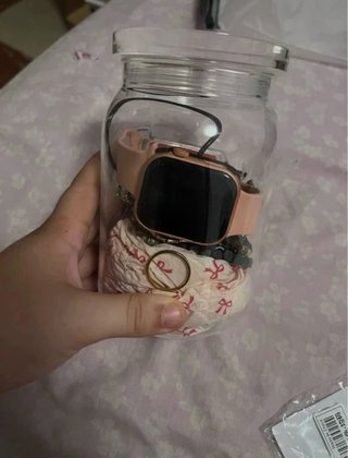 Bote con joyas y reloj