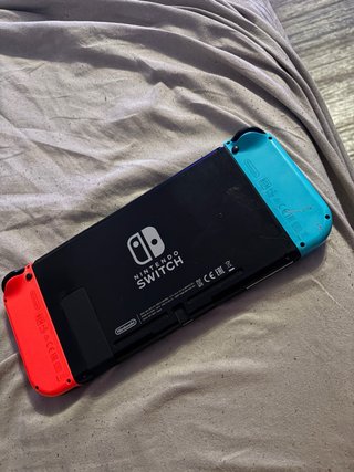 Nintendo Switch + Base e Caricatore