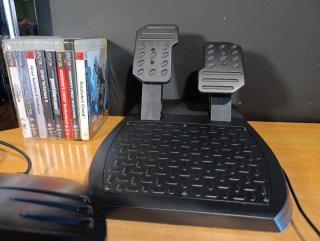 Consola PS3 con 300 Gb + Volante Ferrari + Giochi