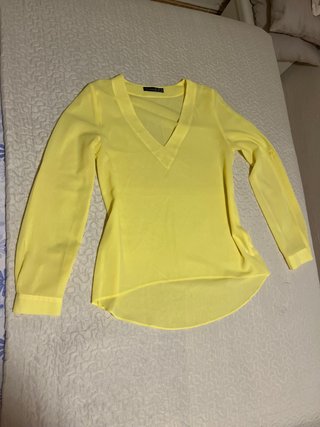 Blusa amarilla pastel