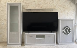 Mueble de 3 módulos con diseño circular