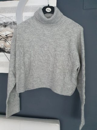 Jersey gris cuello alto