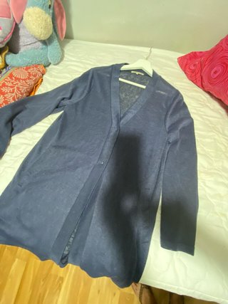 Rebeca fina azul con bolsillos