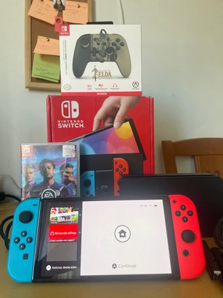 Nintendo Switch Oled + fifa 19 + mando zelda