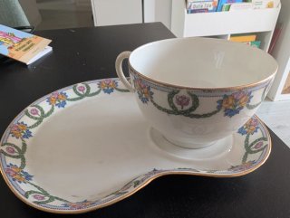 Taza de té con plato a juego firmado m-flres limog