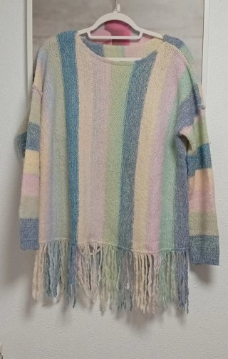 Jersey de punto multicolor con flecos