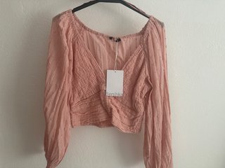 Top corto plumeti Bershka rosa