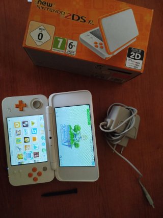 New Nintendo 2DS XL Naranja con caja y juegos