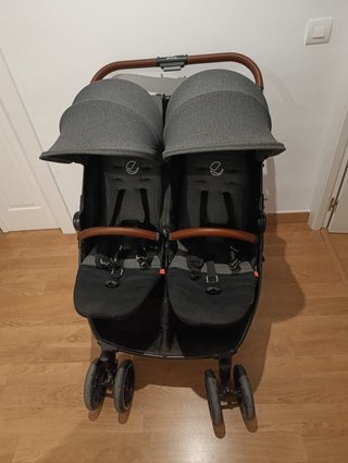 Carrito gemelar con accesorios
