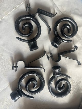 Soportes para cortinas con diseño espiral