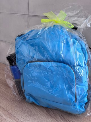 Mochila y botella azul/gris