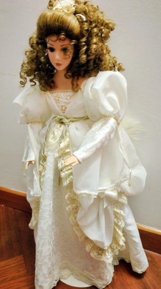 Muñeca porcelana musical vintage