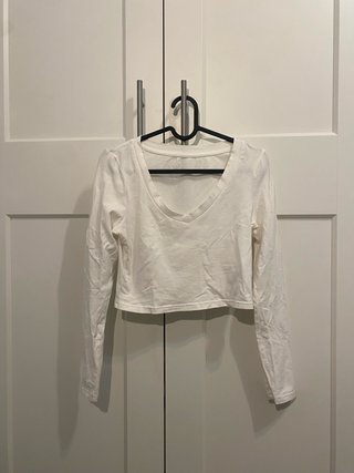 Crop top blanco de manga larga