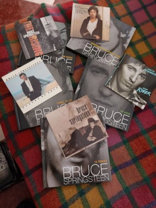 Lote  CDs Bruce Springsteen con libro y DVD
