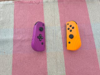 Joycon ergonómico Naranja y Morado Nintendo Switch
