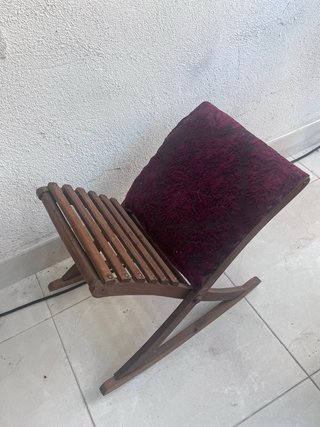 Sillón plegable de madera y tela