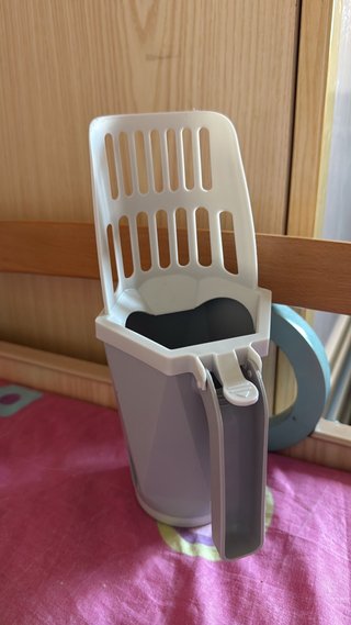Pala para arena de gato