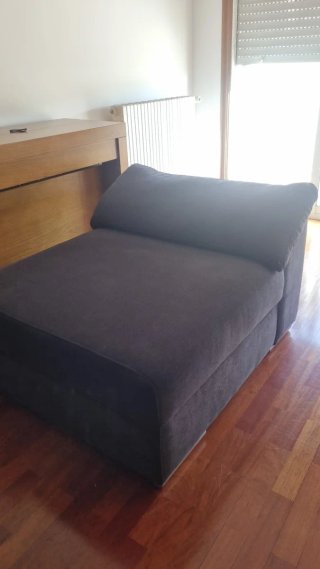 Sofá individual gris