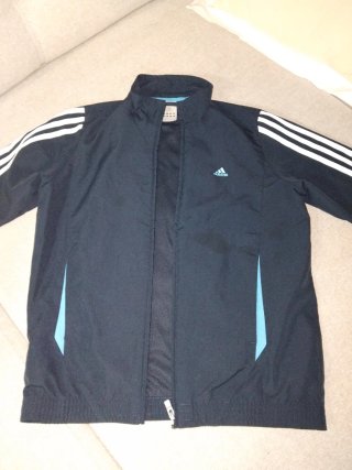 Chaqueta deportiva Adidas negra y turquesa