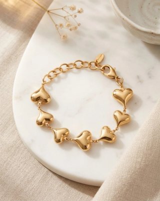 Bracciale con cuoricini dorati