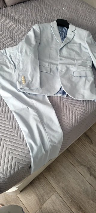 Traje de chaqueta y pantalón azul