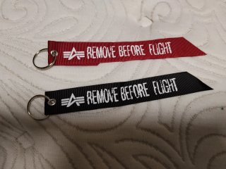 Banda Alpha Industries Remove Before Flight