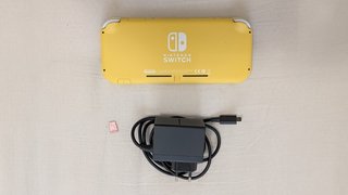 Nintendo Switch Lite Gialla + Zelda + Mario + SD