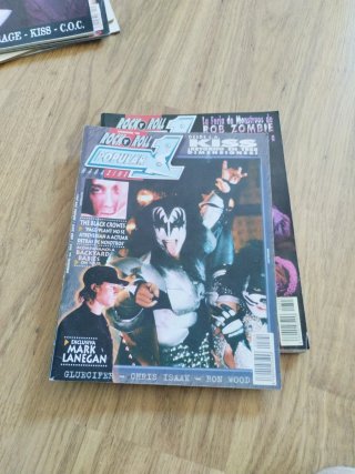 4 revistas popular 1, con KISS en portada
