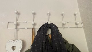 Colgador de pared metálico blanco
