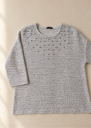 Jersey H&M con detalles plateados