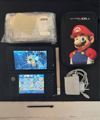 Nintendo 3DS XL con giochi e accessori
