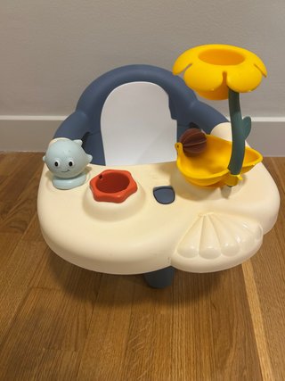 Asiento de baño para bebé con juegos