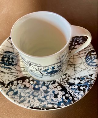 Taza de café con plato