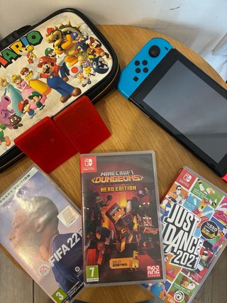 Nintendo Switch + 3 juegos +estuche