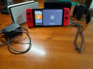 Nintendo Switch OLED con accessori (come nuova)