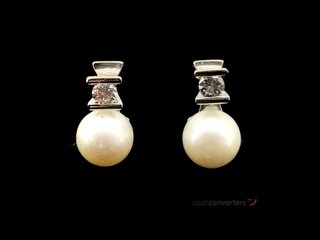 pendientes oro 18k con piedra con diamante,perla