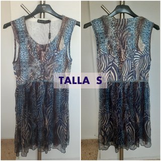 Vestido nuevo sin estrenar con etiqueta. Sin manga