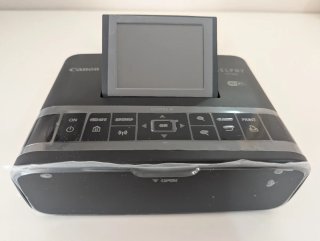 Impresora Canon Selphy CP1300 + Papel