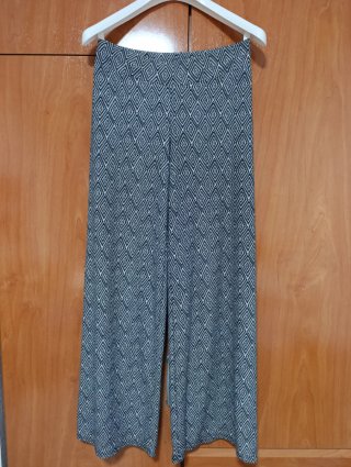 Pantalones campana estampado geométrico