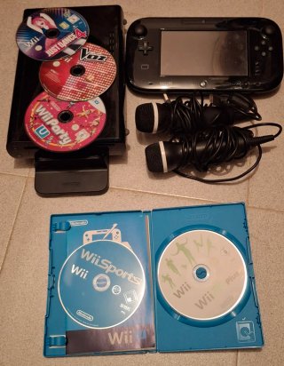 Console Nintendo Wii U nera con giochi