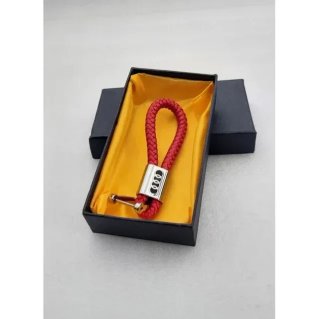 Llavero cuero rojo trenzado logo metálico Audi