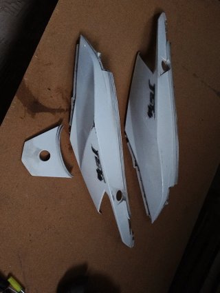 Tapas laterales traseras Sym Jet 14