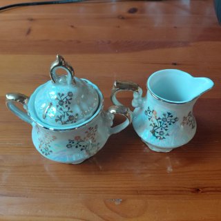 Juego porcelana japonesa nacarada y oro