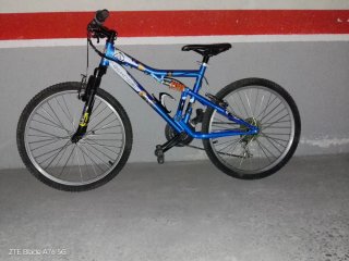 Bicicleta de montaña doble suspensión 24”